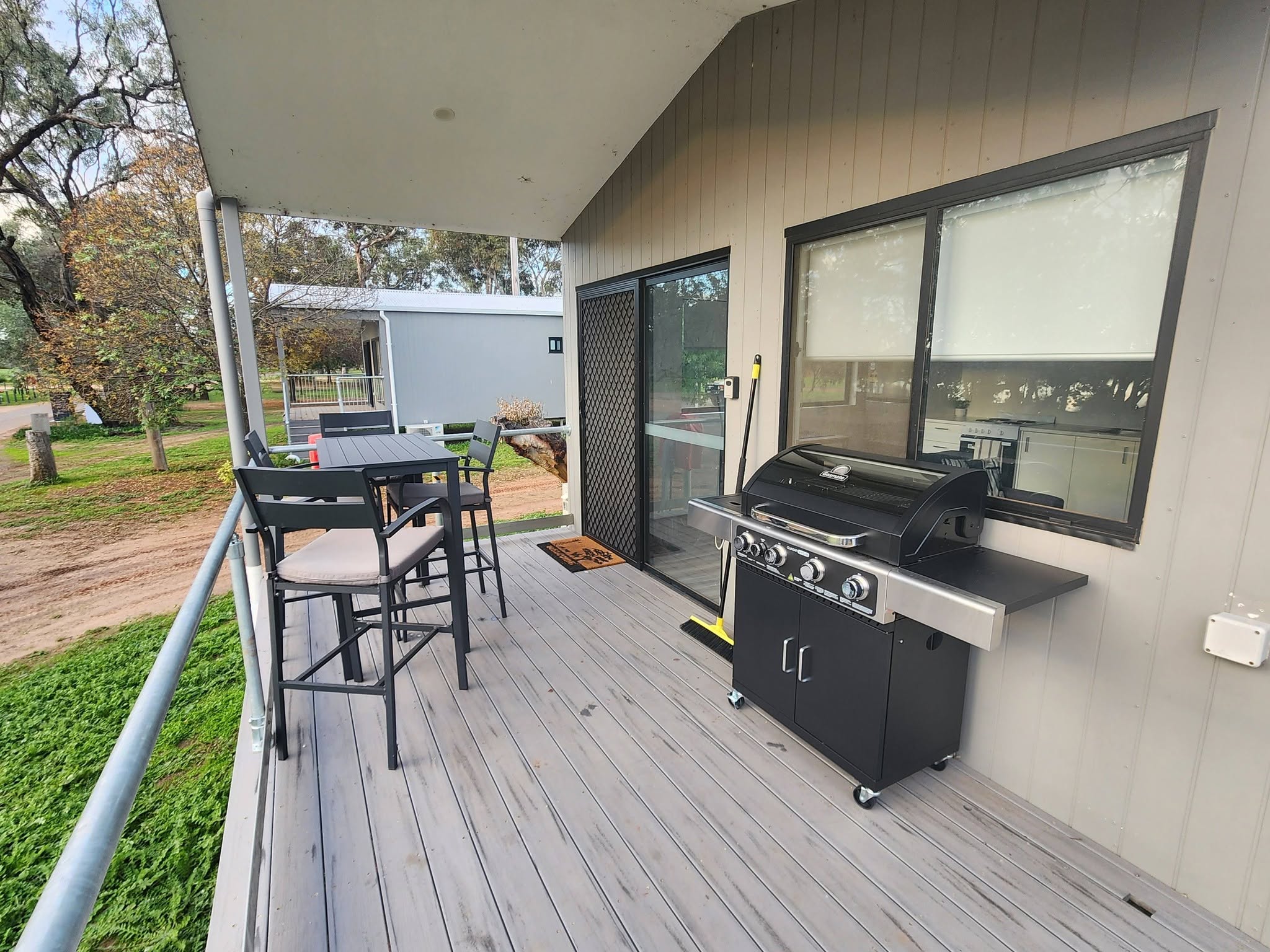 Outdoor deck and BBQ at the Green Lake cabin